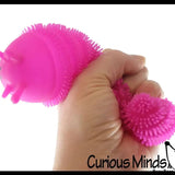 faire - curious minds toys fidget toys Pink Squeeze Slug Light Up Fidget Toy