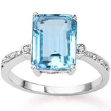 Emerald Cut Baby Blue Topaz Ring with Diamond Accents in 14K Gold