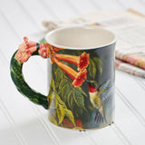 Faire-wild wings hummer mug HUMMINGBIRD SCULPTURED MUG ARTWORK BY ROSEMARY MILLETTE