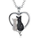 Monica Fine Fashion Jewelry-Necklace Two Cats in a Heart Necklace in 925 Silver, Darling!  White and Black Kitties