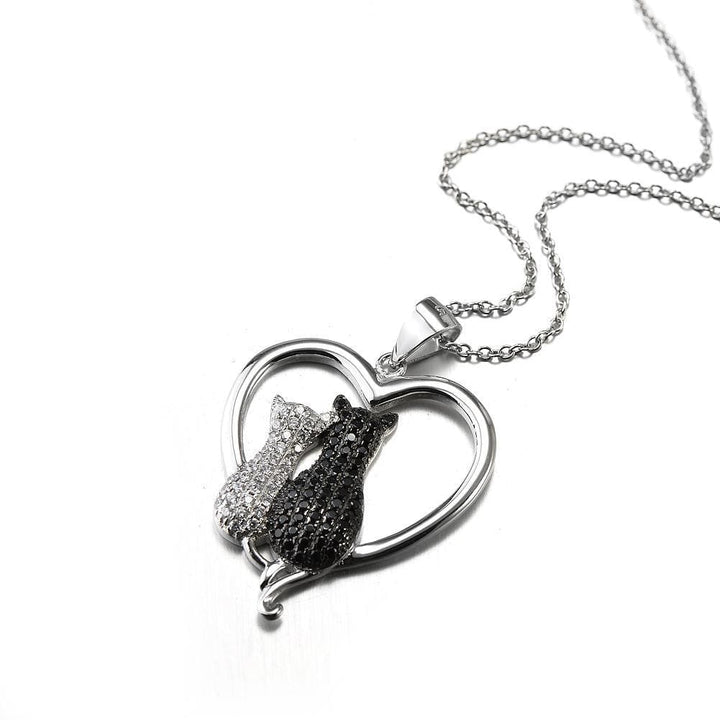 Monica Fine Fashion Jewelry-Necklace Two Cats in a Heart Necklace in 925 Silver, Darling!  White and Black Kitties